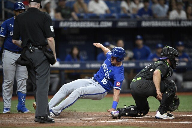 Royals extend their win streak to eight games, score three in the 11th to beat Rays 7-4