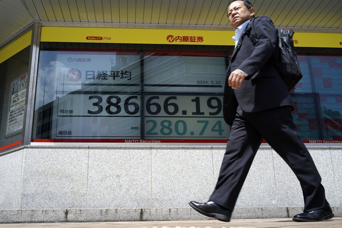 Stock market today: Asian shares mostly higher after Wall Street sets more records